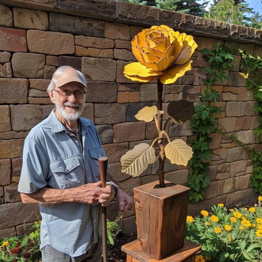 My dad made a wooden rose for our garden, please appreciate it