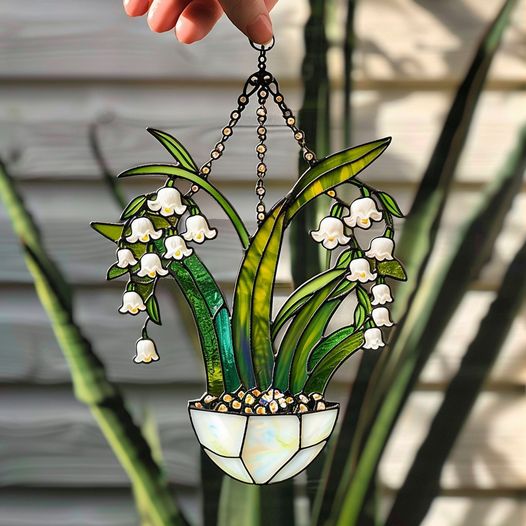 A delicate bloom of glass to brighten your day—ready to hang?