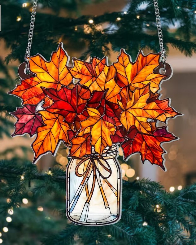 Celebrate Christmas with the warmth of autumn leaves glowing in glass