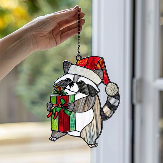 Raccoon in a Santa hat, spreading Christmas magic!