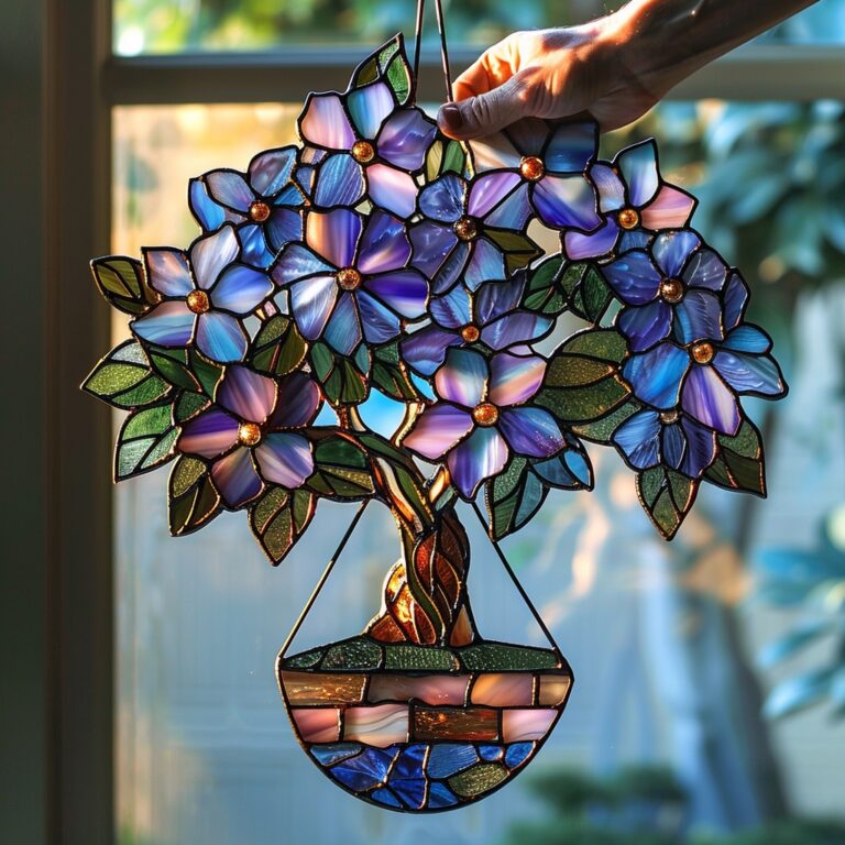 Beautiful stained glass hydrangeas 🌸 in shades of blue and purple, delicately crafted into a hanging planter, brighten up any space with their vibrant charm.